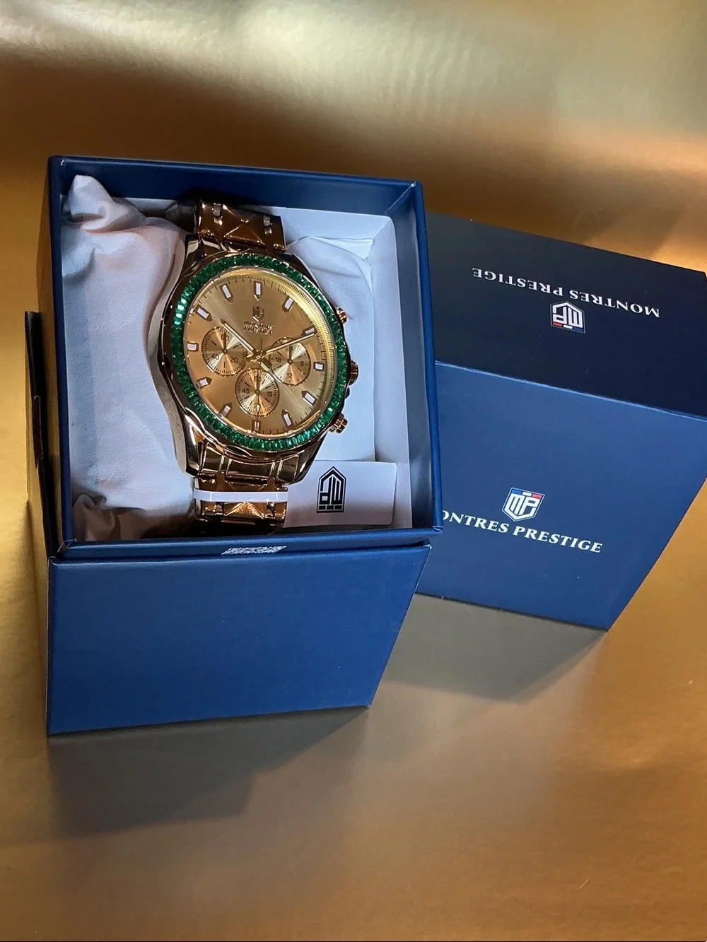Invicta Gold Tone Watch with Green Bezel